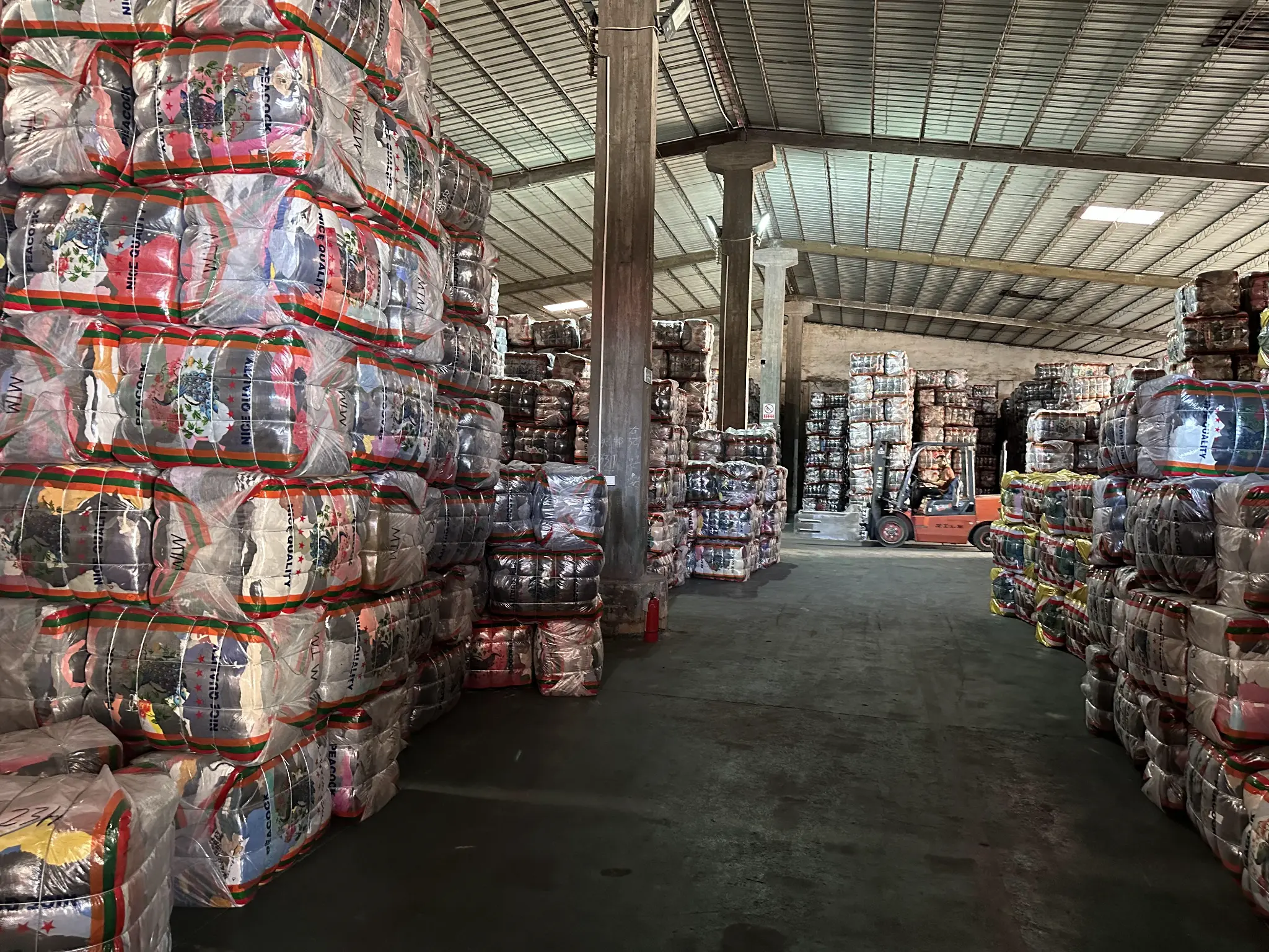Factory interior with organized bales